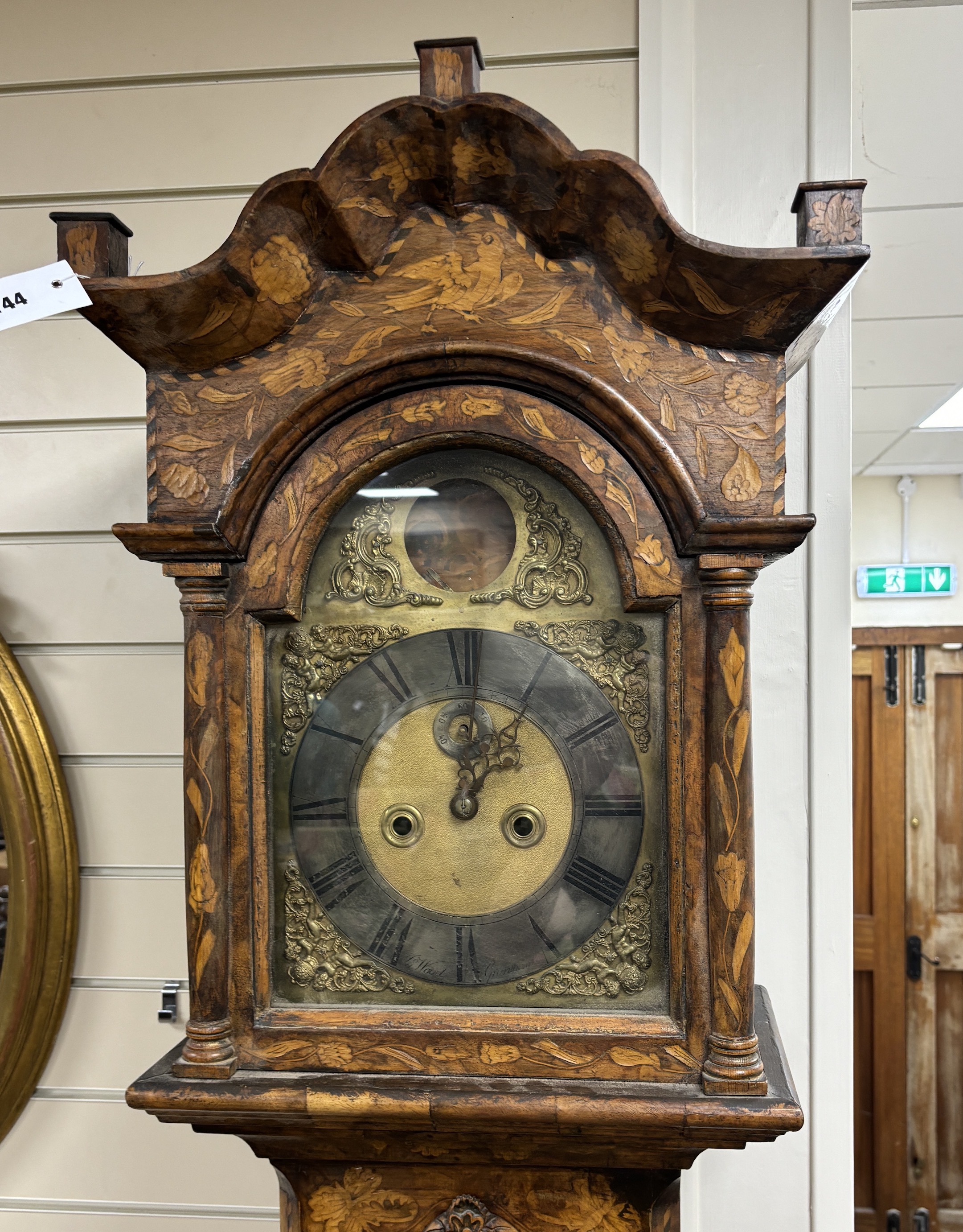 A 19th century Dutch floral marquetry walnut eight day longcase clock, the arched dial marked John Wood, Grantham, height 226cm